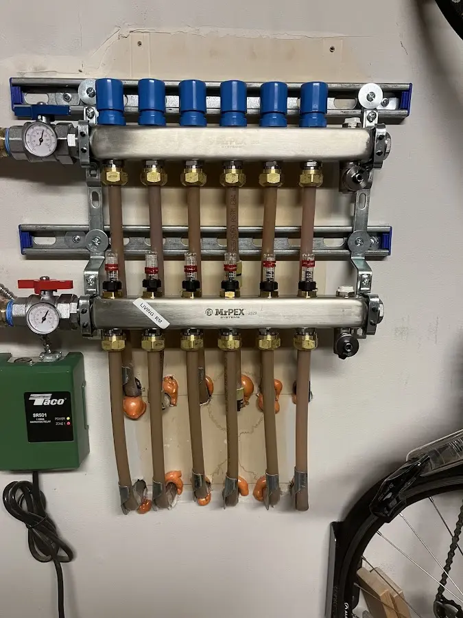 Plumber performing Water Heater Repair at a residential property in Mountlake Terrace